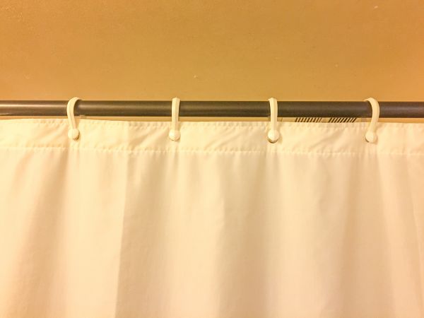 Shower Curtain Hanging in Kenner