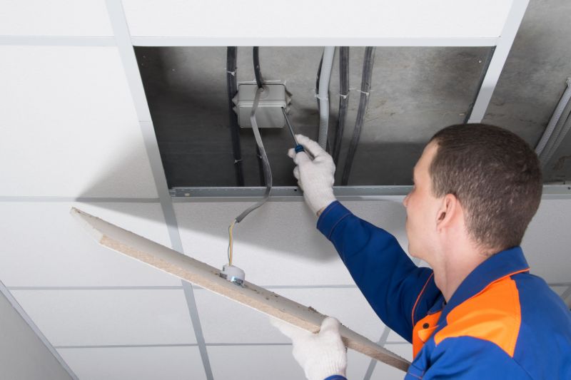Handyman Fixing a Ceiling